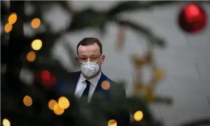  ??  ?? The German health minister, Jens Spahn, arrives for a Covid news conference in Berlin on Tuesday. Photograph: Reuters