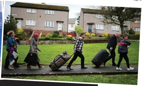  ??  ?? A long way from home: Above and left, Syrians arriving on Bute this month. Far left: The island’s idyllic seafront