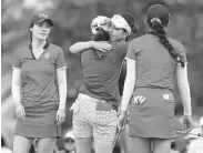  ?? Gregory Shamus / Getty Images ?? Europeans Georgia Hall and Leona Maguire celebrate after winning their foursomes match over Team USA.