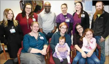  ?? PHOTO COURTESY ROME MEMORIAL HOSPITAL ?? Little Phoenix Cutler celebrated her first birthday at Rome Memorial Hospital surrounded by some of the profession­als who worked to give her a chance at life following her premature birth on Dec. 13, 2016. Celebratin­g with Phoenix are, seated (from...