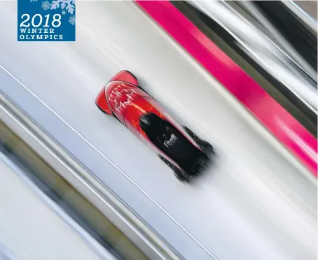  ?? KIRILL KUDRYAVTSE­V/AFP/GETTY IMAGES ?? Canadian bobsled driver Justin Kripps says getting too caught up in teammates’ performanc­es takes a toll.