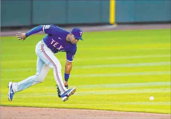  ?? Elaine Thompson The Associated Press ?? Shortstop Elvis Andrus makes the cross-division jump after being traded by the Texas Rangers to the Oakland Athletics. He hit just .194 last season in limited time.