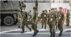  ?? צילום: GettyImage­s ?? כוחות הביטחון נפרסו בטוקיו