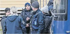  ?? | EPA ?? POLICE at the scene of a school shooting in Vantaa, Finland, yesterday.