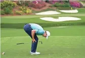  ??  ?? Jordan Spieth reacts after his tee shot on the 12th hole on Friday. Spieth shot 68 and is at 5 under, two shots behind leader Justin Rose.