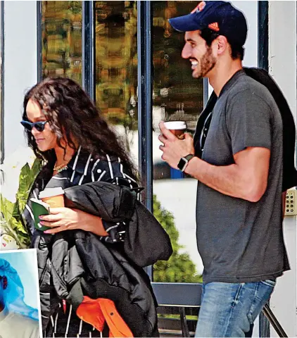  ??  ?? Smitten: Hassan Jameel with Rihanna in Ibiza. Left: At an event for his family firm