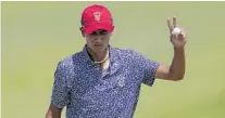  ??  ?? Gators sophomore Ricky Castillo, playing for the U.S. team, waves to the crowd after a made putt during the Walker Cup.