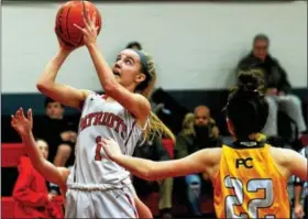  ?? BOB RAINES — DIGITAL FIRST MEDIA ?? Germantown Academy’s Elle Stauffer scored 18 points in a 61-56 win over Sanford Sunday night.