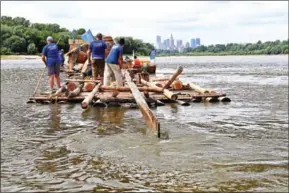 ?? JANEK SKARZYNSKI/AFP ?? Passionate Poles revive the ancient practice of ‘timber floating’ on the Vistula River near Warsaw, Poland, on July 14.