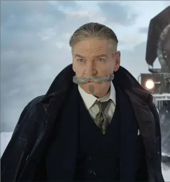 ??  ?? Kenneth Branagh as moustachio­ed sleuth Hercule Poirot in Murder on the Orient Express