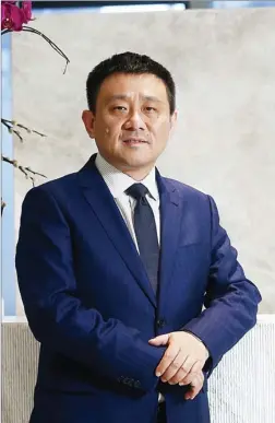 ?? ROY LIU / CHINA DAILY ?? Chen Qiyu, co-president of mega Chinese mainland conglomera­te Fosun Internatio­nal, points out that the pursuit of evolving into a technology-powered group is in line with China’s economic reform momentum.