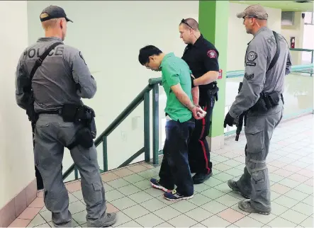  ?? GAVIN YOUNG ?? Jin Qing Huang, 42, of Calgary pleaded guilty Friday to second-degree murder in the death of 51-year-old Tiejun Huang in the Perpetual Wellness Chinese Medicine Centre. Court heard he believed the acupunctur­ist was having an affair with his wife.