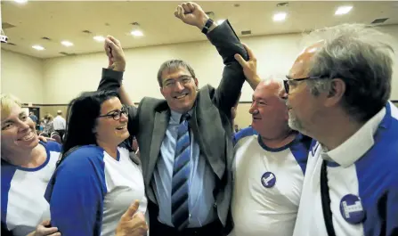  ?? CLIFFORD SKARSTEST/EXAMINER ?? Winning candidate Dave Smith celebrates with his campaign team during the Peterborou­gh-Kawartha riding Progressiv­e Conservati­ve nomination meeting Thursday night at the Evinrude Centre. See more photograph­s from the meeting in the online gallery at...