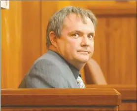  ?? Picture: FREDLIN ADRIAAN ?? BLOODY EVIDENCE: Warrant-Officer Phillip Bekker in court yesterday. He linked shoes found with one of the accused in the murder trial of George Venter and his wife Cobi to bloody prints left at the crime scene