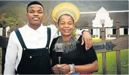  ?? Picture: SOWETAN ?? HOPE BY THE GLASS: Lintonpark­s Wine Estate produces Bridge of Hope wines, owned by Rosemary Mosia, right, with her son, Mojalefa Mosia. They were on show at the inaugurati­on of President Cyril Ramaphosa at the weekend.
