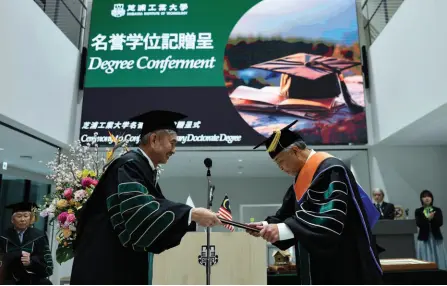  ?? — Bernama photo ?? Yamada confers the honorary PhD on Ahmad Zahid.