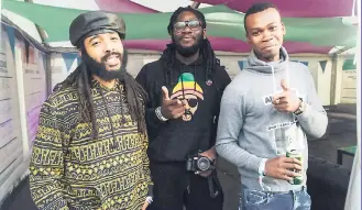  ??  ?? From left: Protoje, Yannick Reid and Gregory Morris, Protoje’s mixing engineer, on tour. AT RIGHT: Protoje in performanc­e.
