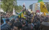  ?? NASSER NASSER — THE ASSOCIATED PRESS ?? Mourners march during the funeral of Iran’s top general Qassem Soleimani in Baghdad, Iraq, on Saturday.