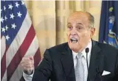  ?? KATHY WILLENS/AP ?? The New York Post says it received a copy of a hard drive containing the emails from Trump lawyer Rudy Giuliani.