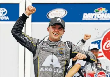  ?? THE ASSOCIATED PRESS ?? William Byron celebrates his win in a NASCAR Xfinity Series race last month at Daytona Internatio­nal Speedway. The 19-year-old rising star will drive the Hendrick Motorsport­s No. 5 Chevrolet in Cup Series races next year.