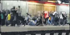  ?? AFP ?? This grab reportedly shows Iranians at a metro station in Tehran fleeing and falling down as gunshots are heard.