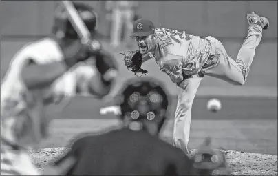  ?? AP PHOTO ?? Chicago Cubs’ Cole Hamels delivers a pitch during Wednesday’s game against the Pittsburgh Pirates in Pittsburgh.