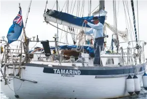  ??  ?? ABOVE: Mervyn preparing his Formosa 42
Tamarind ahead of the start of the 2017 OSTAR. He was forced to abandon the yacht after it was rolled in a 70-knot storm. He was rescued by the Queen Mary 2 luxury liner