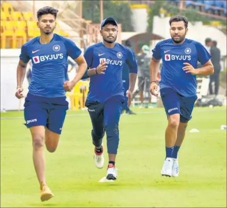  ?? PTI ?? India captain Rohit Sharma (R) with teammates Shreyas Iyer (L) and Sanju Samson during a practice session ahead of the second T20 match against Bangladesh in Rajkot. The hosts lost the first game of the three-match series by seven wickets.