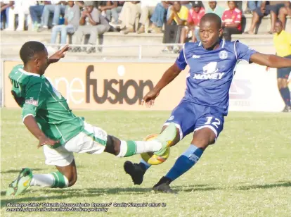  ??  ?? Bulawayo Chiefs’ Takunda Muzuva blocks Dynamos’ Quality Kangadzi effort in a match played at Barbourfie­lds Stadium yesterday