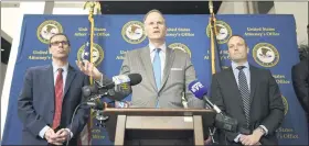  ?? LAUREN A. LITTLE — MEDIANEWS GROUP ?? William M. McSwain, U.S. attorney for the Eastern District of Pennsylvan­ia, announces charges against Philip Riehl in January. Riehl operated a Ponzi scheme that targeted the Mennonite and Amish communitie­s. At left is Michael J. Rinaldi, assistant U.S. Attorney Deputy Chief, economic crimes, and at right is Jared W. Witmier, supervisor­y special agent Allentown.