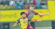  ?? ISL ?? Manvir Singh (right) of ATK Mohun Baga and Hyderabad FC’s Akash Mishra vie for the ball during their semi-final.