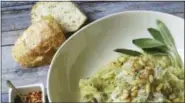  ?? SARA MOULTON VIA AP ?? This March 2018 photo shows spaghetti squash with creamy goat cheese sauce and shredded zucchini in New York. This dish is from a recipe by Sara Moulton.