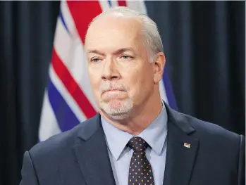  ?? CHAD HIPOLITO/THE CANADIAN PRESS ?? Premier John Horgan says he believes the federal government is now “totally accountabl­e” for any issues involved with the Trans Mountain Pipeline, including the threat of a spill.