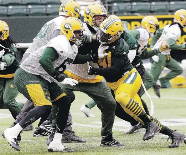  ?? DAVID BLOOM ?? The solid play of D’Anthony Batiste, left, and the Eskimos offensive line has allowed the team to boost its rushing totals in recent weeks.