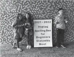  ?? ?? INUPIAQ WINNERS— Left to right: third place winner Kimasuq Danielle Tocktoo, grade 5, Brevig Mission, first place winner Kopeck Kaitlyn Alston, 5 grade, Brevig Mission; second place Ikiituk Donald Olson Jr., 8 grade, Golovin.