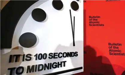  ??  ?? The Doomsday Clock reads 100 seconds to midnight, indicating the planet remains dangerousl­y close to nuclear and climate change catastroph­e. Photograph: Eva Hambach/AFP via Getty Images