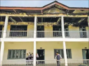  ?? NEELAM PANDEY/HT PHOTO ?? Children at a school that was set ablaze last year in South Kashmir’s Anantnag.