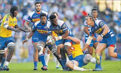  ?? Picture: GALLO IMAGES ?? BRUTE POWER: Siya Kolisi, captain of the Stormers, is tackled with ball in hand during the Super Rugby match against the Bulls at the Newlands Stadium, Cape Town on Saturday. The Stormers won 29-17