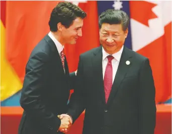  ?? DAMIR SAGOLJ/ REUTERS ?? Canada's new framework for China is overdue, says Kevin Carmichael. He says failing to constructi­vely engage now will be harmful. Above, PM Justin Trudeau meets Chinese President Xi Jinping.