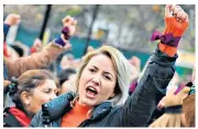  ??  ?? A protester during a march in Turkey for women’s rights