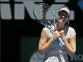  ?? VINCENT THIAN — THE ASSOCIATED PRESS ?? Russia’s Maria Sharapova celebrates win over Latvia’s Anastasija Sevastova in their second round match at the Australian Open tennis championsh­ips in Melbourne, Australia, Thursday.