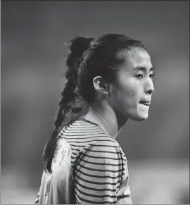  ?? PROVIDED TO CHINA DAILY ?? Above: Zhao Lina, who represente­d China at the 2016 Olympics and has more than 50 caps for internatio­nal play, is hopeful the nation’s female profession­al players will one day earn salaries comparable to their male counterpar­ts. Right: The 6-foot-2...