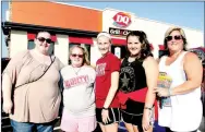  ?? LYNN KUTTER ENTERPRISE-LEADER ?? These ladies showed up at 10 p.m. Sunday night to make sure they would be first in line for free Dairy Queen blizzards for the next year. For its grand opening, DQ offered free weekly blizzards with the purchase of an ice cream cake to the first 100...