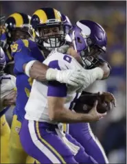  ?? JAE C. HONG — THE ASSOCIATED PRESS ?? The Eagles want to get to Minnesota quarterbac­k Kirk Cousins the way Los Angeles Rams defensive tackle Aaron Donald did in a 38-31 victory over the Vikings.