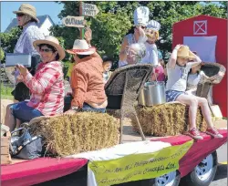  ?? ERIC MCCARTHY/JOURNAL PIONEER ?? “Up West, Where the Fun Begins,” was the theme for the Prince County Exhibition Parade in Alberton, and the participan­ts on the Rev. W.J. Phillips Residence float were living up to it.