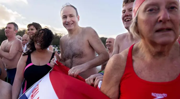  ??  ?? GET IN THE SWIM: Fianna Fail leader Micheal Martin at the Courtmacsh­erry, Co Cork New Year’s Swim in aid of the local RNLI Lifeboat. Photo: Michael Mac Sweeney