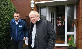  ??  ?? Boris Johnson door-knocking in Mansfield, Nottingham­shire on 16 November. Photograph: Stefan Rousseau/PA