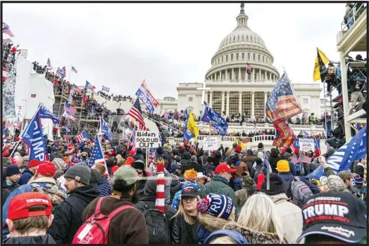 ?? PHOTO BY MIHOKO OWADA/STAR MAX/IPX ?? Rioters loyal to President Donald Trump rally at the U.S. Capitol in Washington on Jan. 6, 2021.