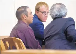  ?? MARLA BROSE/JOURNAL ?? Luis Chavez, left, sits between his two attorneys, Buck Glanz, center, and Craig Acorn, during opening statements in his jury trial Tuesday. Chavez, a former debate coach, is accused of sexually abusing a student in 2014.