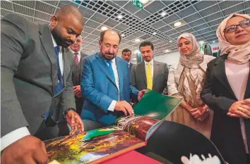  ?? WAM ?? Dr Shaikh Sultan and Ahmad Al Ameri, chairman of the Sharjah Book Authority, at the Sharjah Book Authority’s pavilion at the Frankfurt Book Fair in Germany.